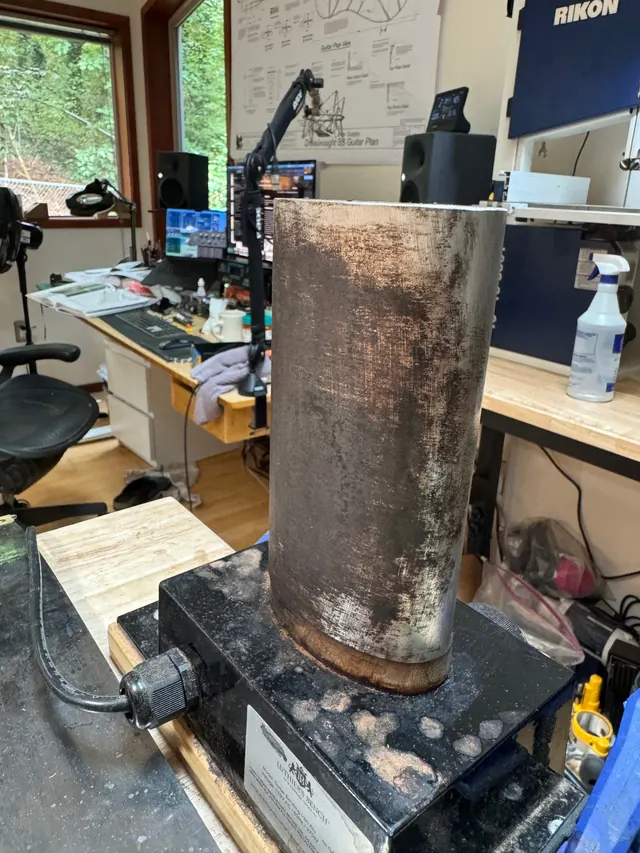The bending pipe heating on its stand in the middle of the shop
