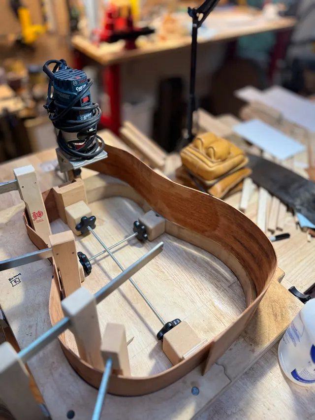 Routing the binding channel around the waist of a body in the workboard
