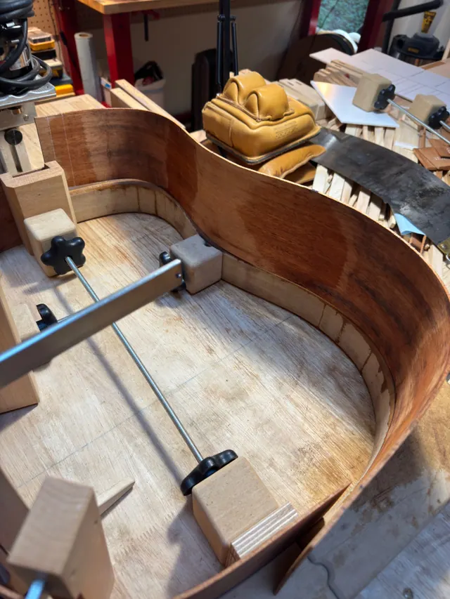 A rim held in its cauls while the blocks set